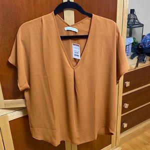 Top brand new tag still on it